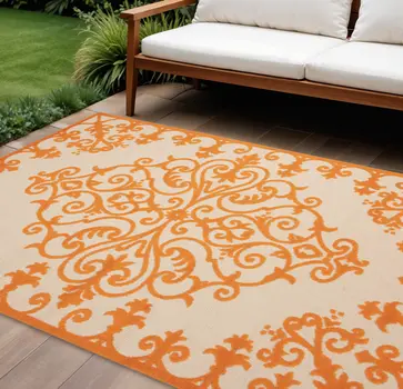 10' X 13' Orange And Ivory Indoor Outdoor Area Rug