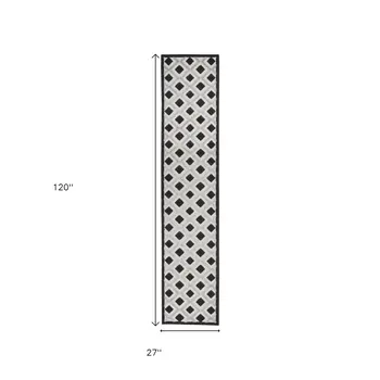 10' Black And White Indoor Outdoor Runner Rug