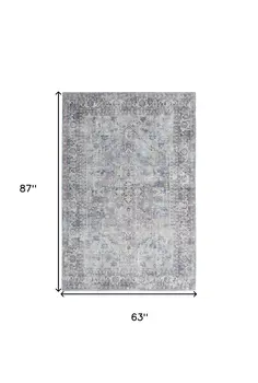 5' X 7' Light Grey And Blue Oriental Power Loom Distressed Washable Area Rug