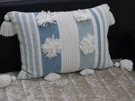 14" X 20" Cream and Blue Striped Cotton Blend Lumbar Throw Pillow With Pom-poms and Tassels