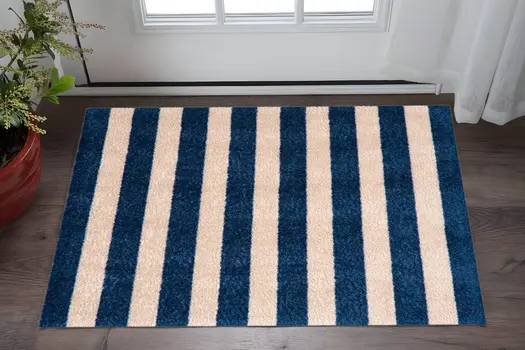 2' X 3' Navy And Sand Striped Tufted Washable Non Skid Area Rug