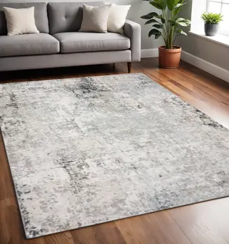 5' X 7' Gray Cream And Taupe Abstract Distressed Stain Resistant Area Rug