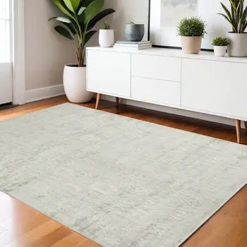 4' X 6' Ivory And Gray Floral Stain Resistant Area Rug