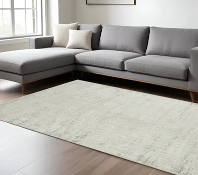 8' X 10' Ivory And Gray Floral Distressed Area Rug
