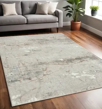 5' X 7' Beige Gray And Brown Abstract Stain Resistant Area Rug