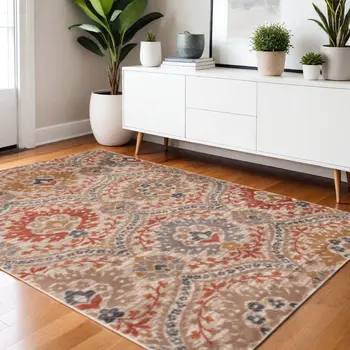 4' X 6' Ivory Orange And Gray Floral Stain Resistant Area Rug