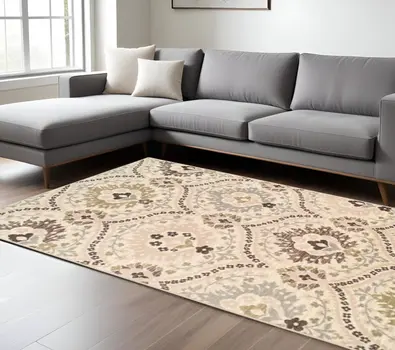 7' X 9' Ivory Gray And Olive Floral Stain Resistant Area Rug