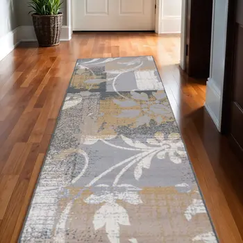 10' Beige And Gray Floral Power Loom Distressed Stain Resistant Runner Rug