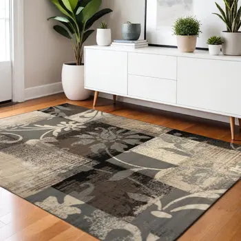4' X 6' Beige And Gray Floral Power Loom Distressed Stain Resistant Area Rug