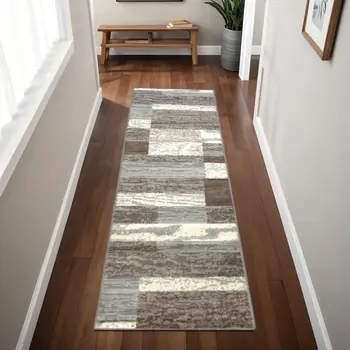 8' Light Blue And Ivory Patchwork Power Loom Stain Resistant Runner Rug