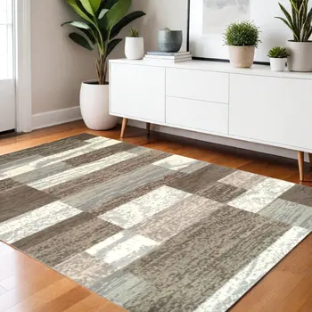 4' X 6' Light Blue And Ivory Patchwork Power Loom Stain Resistant Area Rug