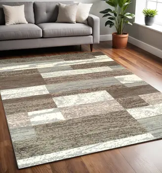 5' X 8' Light Blue And Ivory Patchwork Power Loom Stain Resistant Area Rug