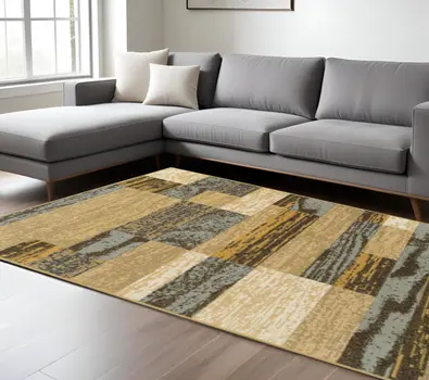 8' X 10' Light Blue And Beige Patchwork Power Loom Stain Resistant Area Rug