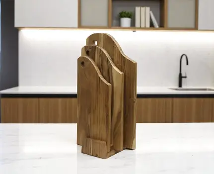 Set of Three Brown Free Form Solid Wood Cutting Boards With Stand