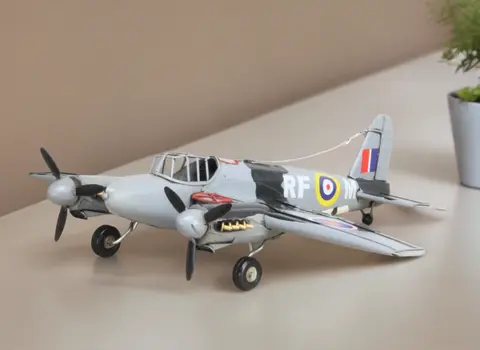 4" Black and Gray Metal Hand Painted Model Airplane Tabletop Sculpture