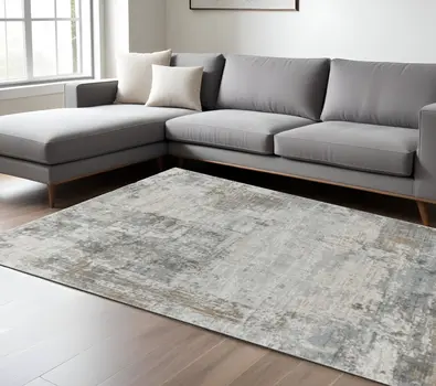 8' X 10' Beige Abstract Power Loom Stain Resistant Area Rug