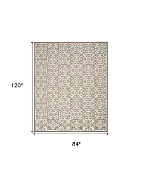 7' X 10' Ivory And Grey Fleur De Lis Stain Resistant Non Skid Area Rug