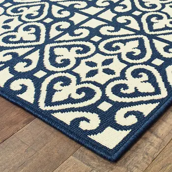 8' X 11' Ivory and Blue Geometric Stain Resistant Indoor Outdoor Area Rug