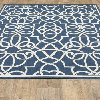 4' X 6' Blue and Ivory Geometric Stain Resistant Indoor Outdoor Area Rug