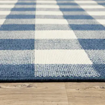 5' X 8' Blue and Ivory Geometric Stain Resistant Indoor Outdoor Area Rug