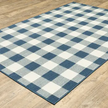 5' X 8' Blue and Ivory Geometric Stain Resistant Indoor Outdoor Area Rug