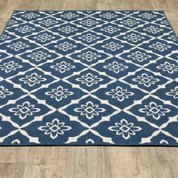 7' x 10' Blue and Ivory Floral Stain Resistant Indoor Outdoor Area Rug