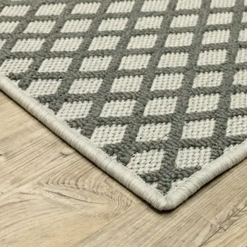 2' X 7' Beige Geometric Stain Resistant Indoor Outdoor Area Rug