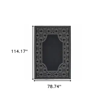 7' X 10' Black and Ivory Stain Resistant Indoor Outdoor Area Rug