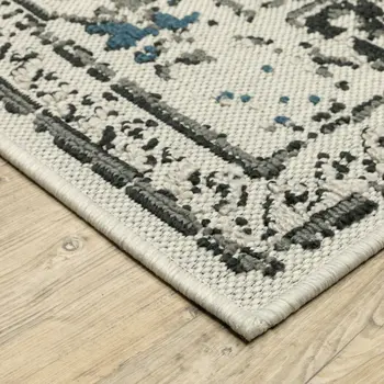 2' X 4' Blue and Beige Oriental Stain Resistant Indoor Outdoor Area Rug