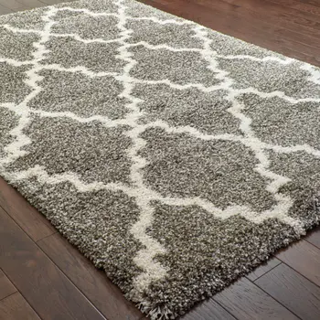 5' X 8' Grey And Ivory Geometric Shag Power Loom Stain Resistant Area Rug