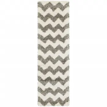 2' X 8' Grey And Ivory Geometric Shag Power Loom Stain Resistant Runner Rug