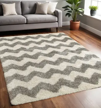 5' X 8' Grey And Ivory Geometric Shag Power Loom Stain Resistant Area Rug