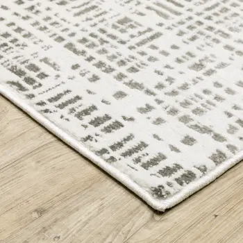 8' X 11' White And Gray Abstract Distressed Area Rug
