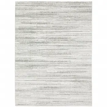 7' X 10' White And Gray Abstract Distressed Area Rug