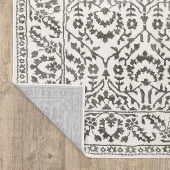 7' X 10' Gray And White Floral Distressed Area Rug
