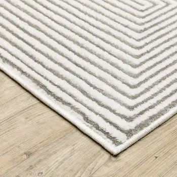 7' X 10' Gray And White Geometric Distressed Area Rug