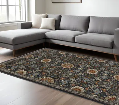 10' X 13' Blue Red Ivory And Gold Oriental Power Loom Stain Resistant Area Rug With Fringe