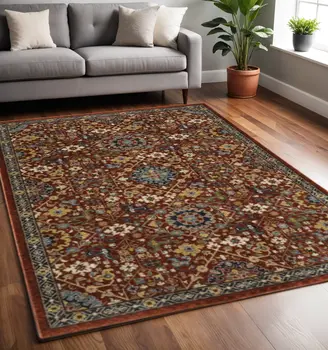 5' X 8' Red Blue Gold And Ivory Oriental Power Loom Stain Resistant Area Rug With Fringe