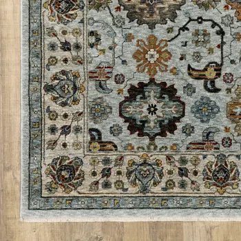 3' X 5' Blue Beige Grey Green Yellow And Rust Oriental Power Loom Stain Resistant Area Rug With Fringe