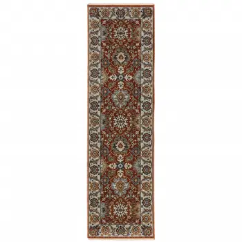 2' X 8' Red Blue Ivory Gold And Navy Oriental Power Loom Stain Resistant Runner Rug With Fringe