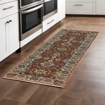 2' X 8' Red Blue Ivory Gold And Navy Oriental Power Loom Stain Resistant Runner Rug With Fringe