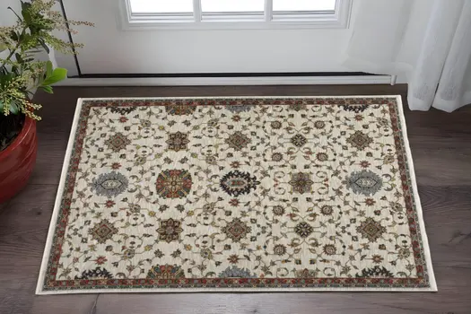 3' X 5' Beige Rust Red Blue Gold And Grey Oriental Power Loom Stain Resistant Area Rug With Fringe