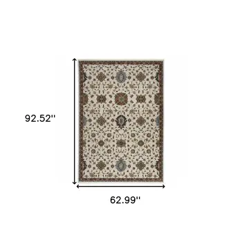 5' X 8' Beige Rust Red Blue Gold And Grey Oriental Power Loom Stain Resistant Area Rug With Fringe