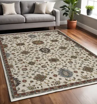 5' X 8' Beige Rust Red Blue Gold And Grey Oriental Power Loom Stain Resistant Area Rug With Fringe