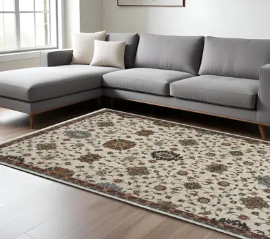 7' X 10' Ivory Red And Yellow Oriental Area Rug With Fringe