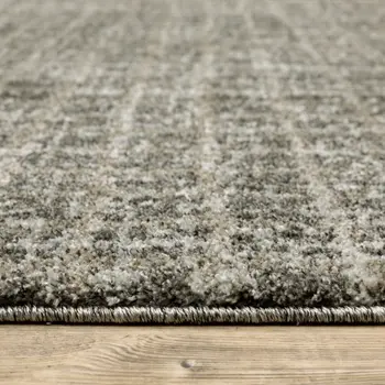 5' X 8' Brown And Beige Geometric Distressed Area Rug
