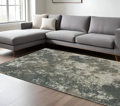 7' X 10' Tan and Gray Abstract Power Loom Area Rug