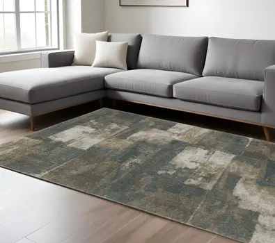 7' X 10' Teal Blue Geometric Power Loom Area Rug