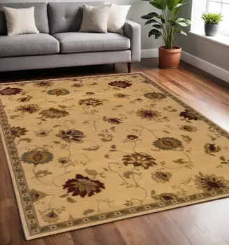 5' X 8' Ivory Green Brown Blue And Rust Floral Power Loom Stain Resistant Area Rug