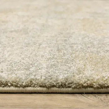 2' X 8' Grey Ivory Beige And Taupe Abstract Power Loom Stain Resistant Runner Rug